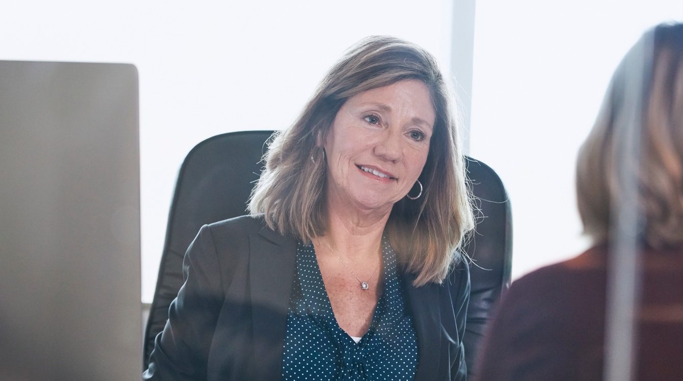 Mary Beth Alber at her desk